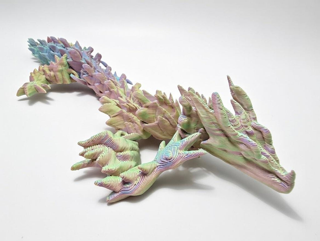 Articulated Spiked Dragon – UV Reactive Pastel 3D Printed Flexi Fidget Toy