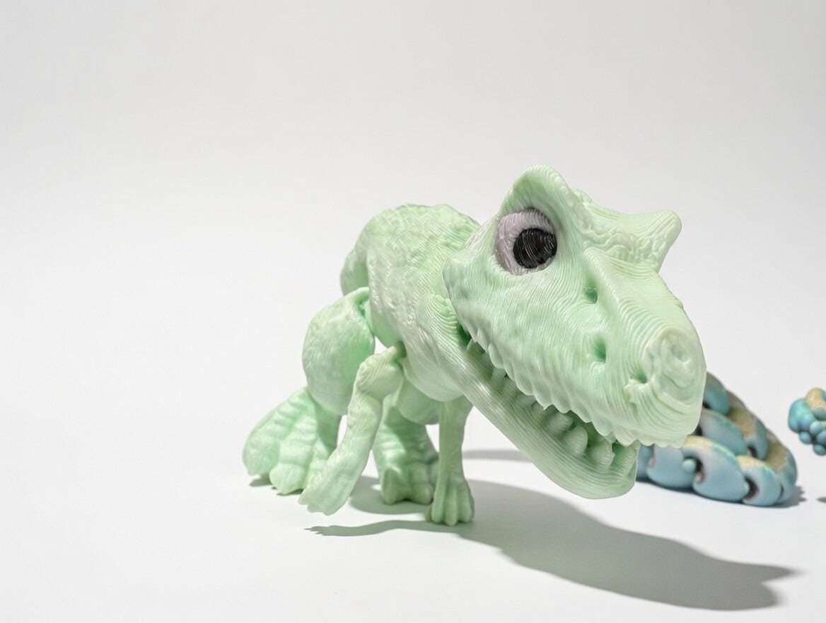 3D Printed Articulated T-Rex – UV Reactive Pastel Fidget Desk Toy