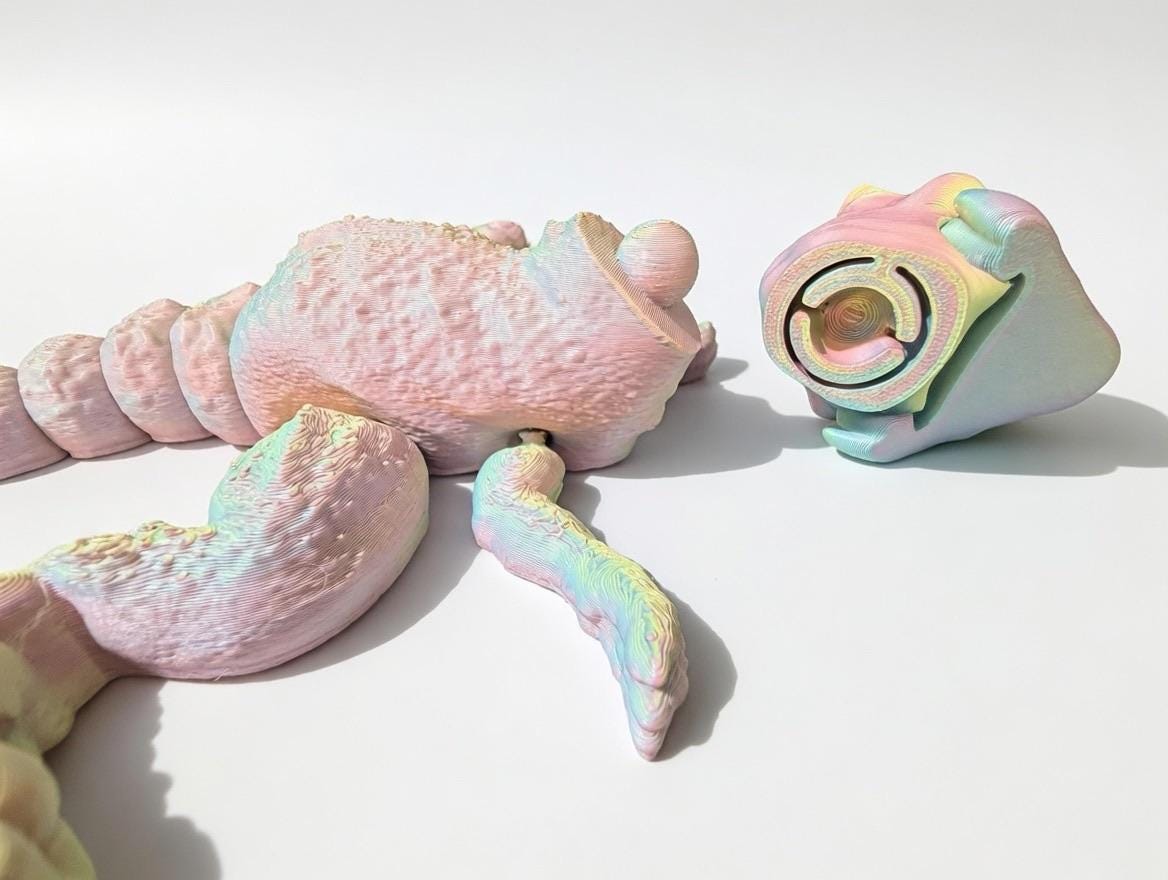 3D Printed Articulated T-Rex – UV Reactive Pastel Fidget Desk Toy